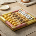 Celebration Dala - Grande a decorative Bengali ceremonial gift dala (tattya) arranged with assorted sweets